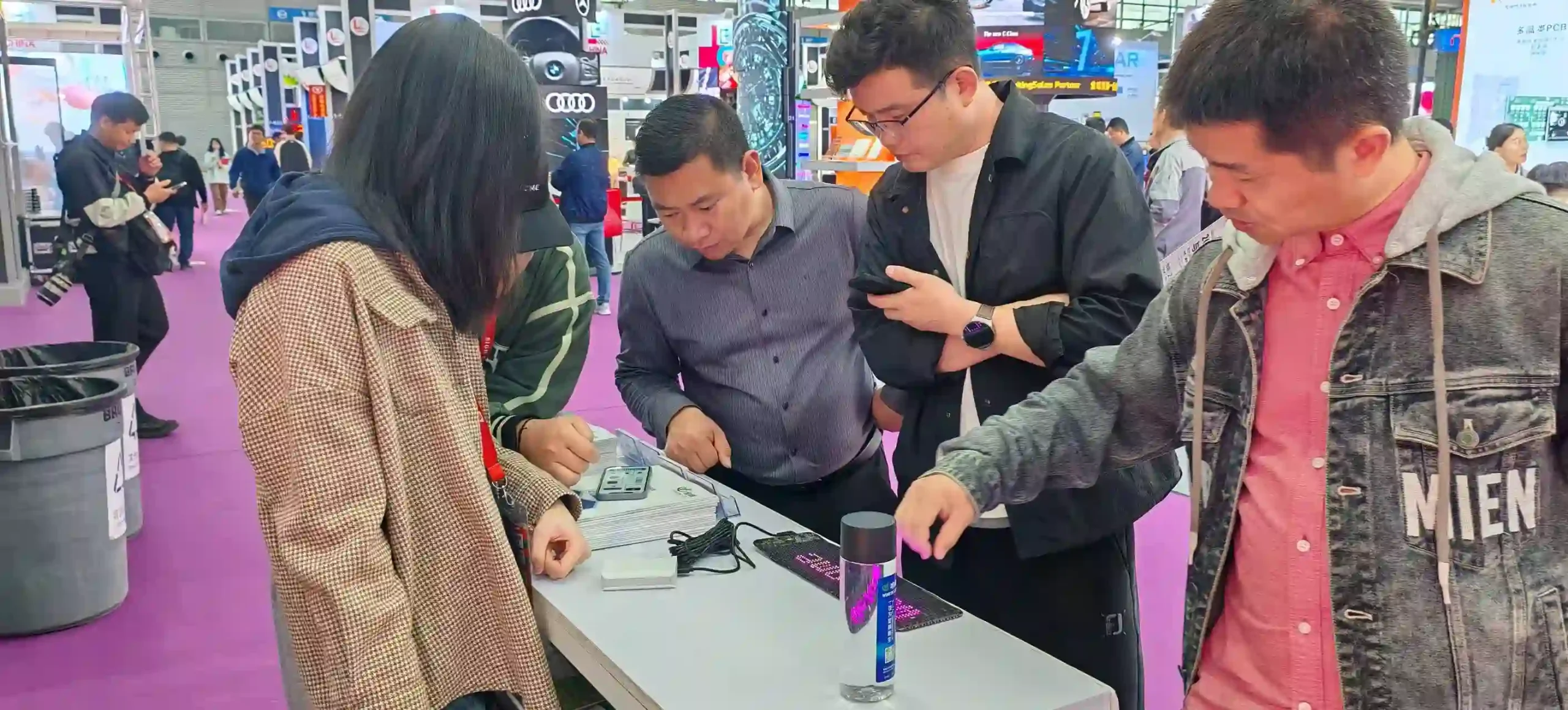 WINFIN LED team discussing LED display requirements with customers