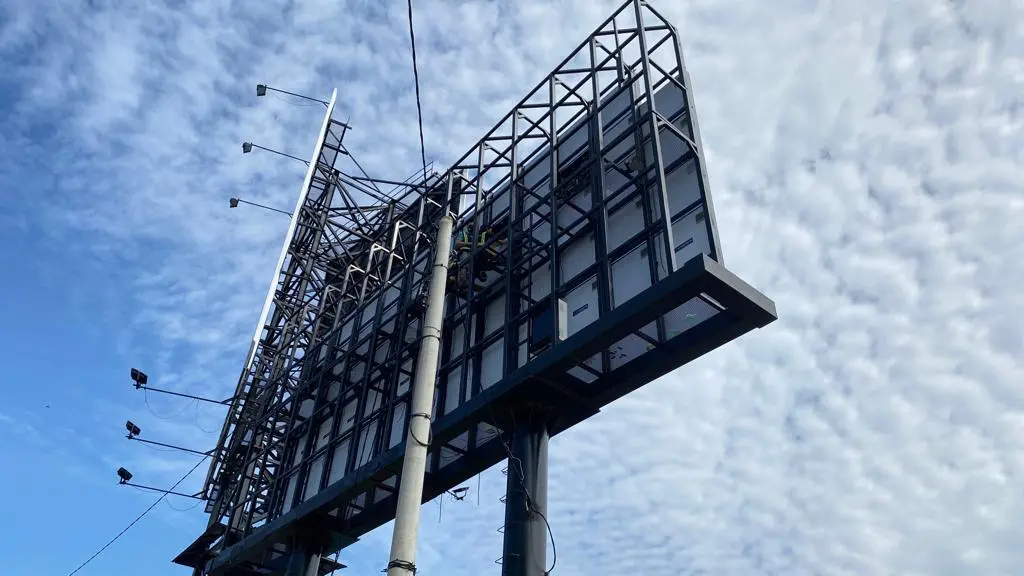 Rear view of an outdoor LED billboard with cabinets mounted on a steel support frame in Malaysia