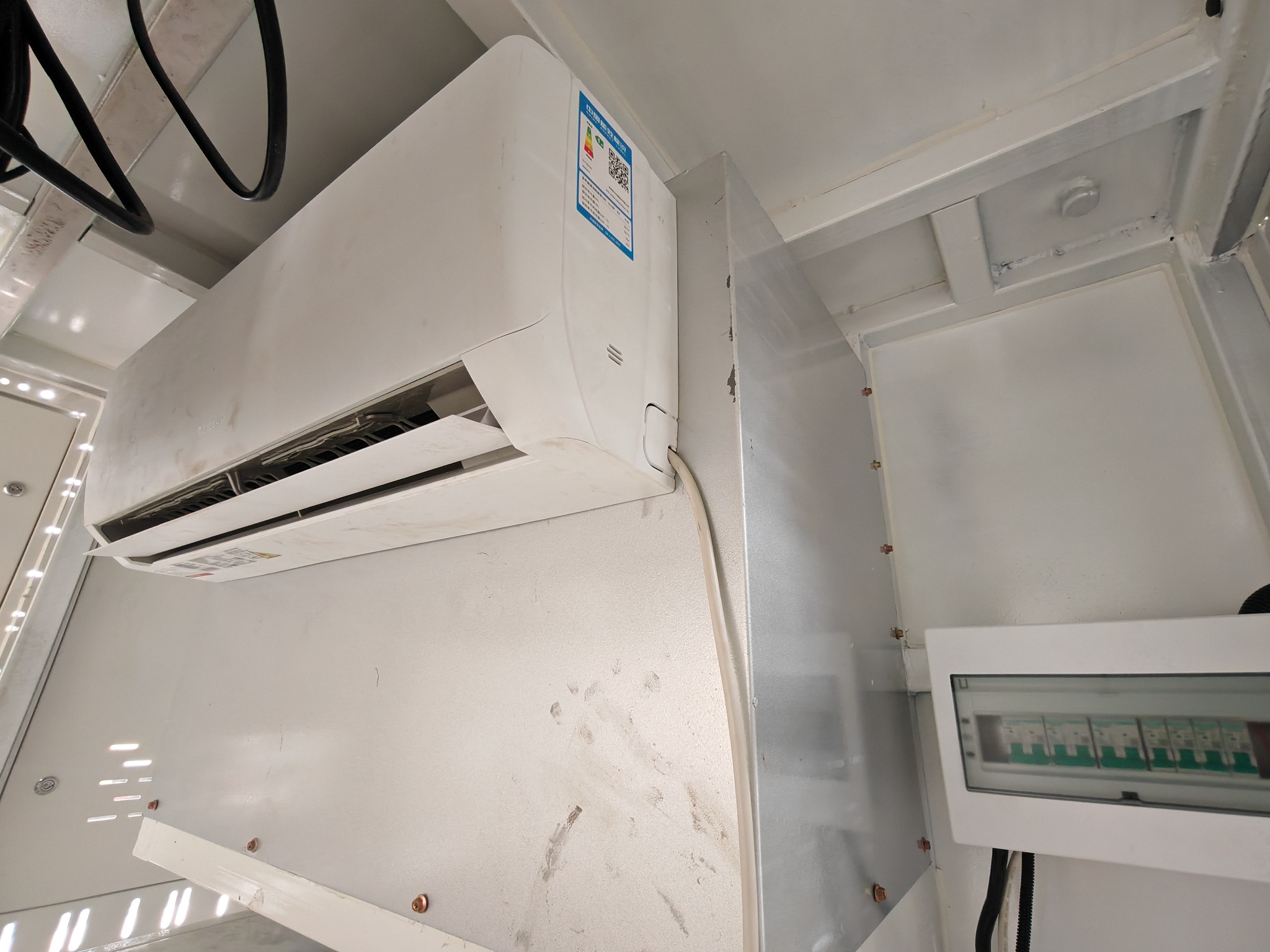 Wall-mounted air conditioner inside a mobile LED advertising truck